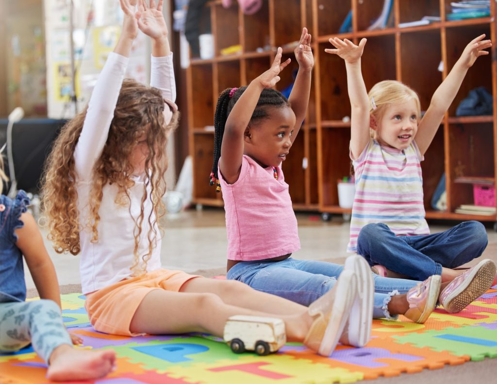 Shot of a group of children sitting in class
